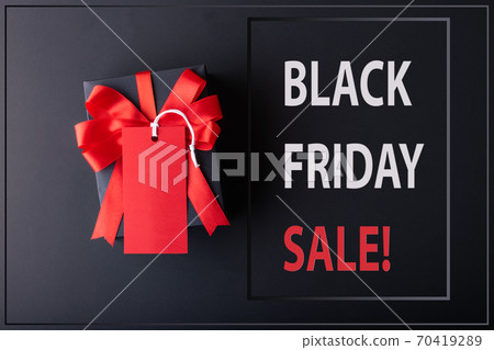 Black Friday sale concept. Red Sale tag  and Black Sale tag color on the black background with Copy space. Black Friday weekend 70419289