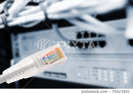 Data connection with rj45 patch cable, conceptual shot. Data connection with rj45 patch cable, conceptual shot. 70423891