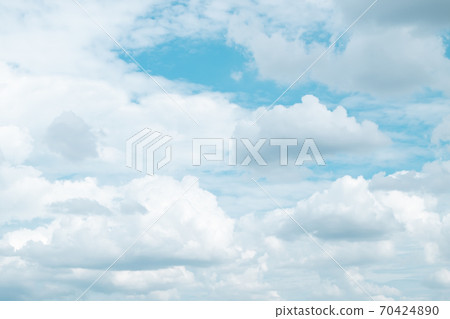 Blurred sky blur or azure sky and white cloud background, beautiful nature on summer. Cloudscape background Blurred sky blur or azure sky and white cloud background, beautiful nature on summer. Cloudscape background 70424890