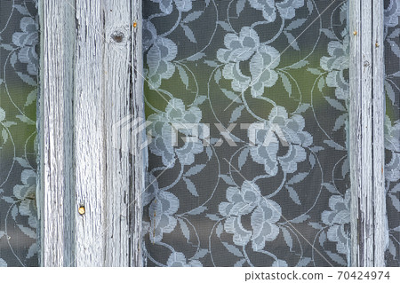 Tulle on the window. 70424974