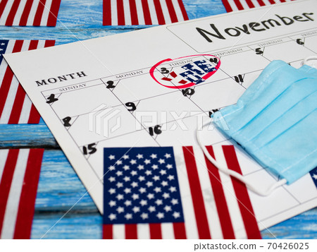 U.S. elections 2020. Coronavirus epidemic. Protective medical mask background. 70426025