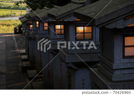 A lantern with a light 70426960