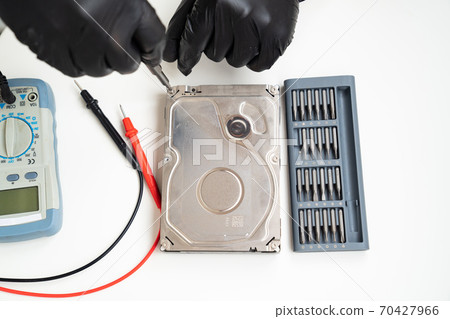 Computer Hard Drive. screwdriver set. black gloves Computer Hard Drive. screwdriver set. black gloves 70427966