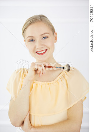 Happy young woman smiling at camera. The best moments of your life Happy young woman smiling at camera. The best moments of your life 70429834