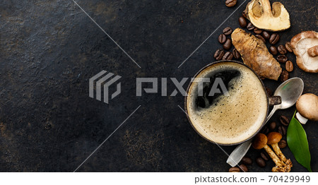 Mushroom Chaga Coffee Superfood Trend-dry and fresh mushrooms and coffee beans on dark background Mushroom Chaga Coffee Superfood Trend-dry and fresh mushrooms and coffee beans on dark background 70429949