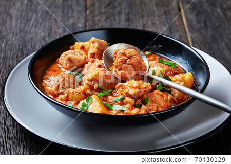 chicken arrabbiata stew with lentil and potato 70430129
