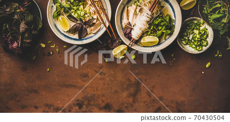 Flat-lay of Vietnamese lunch with soup Pho Ga Flat-lay of Vietnamese lunch with soup Pho Ga 70430504