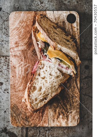Flat-lay of pastrami sandwich slices in sourdough Flat-lay of pastrami sandwich slices in sourdough 70430557