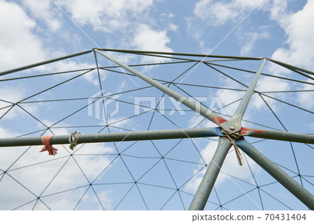 Metal structure against the blue sky. Metal structure against the blue sky. 70431404