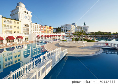 The popular resort Amara Dolce Vita Luxury Hotel. With pools and water parks and recreational area along the sea coast in Turkey. Tekirova-Kemer The popular resort Amara Dolce Vita Luxury Hotel. With pools and water parks and recreational area along the sea coast in Turkey. Tekirova-Kemer 70432111