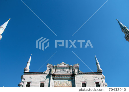 Mosque minarets and Bosphorus bridge in Istanbul in Turkey and the sea of Marmara on background Mosque minarets and Bosphorus bridge in Istanbul in Turkey and the sea of Marmara on background 70432940