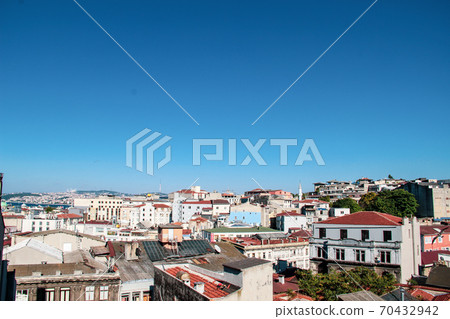 Mosque minarets and Bosphorus bridge in Istanbul in Turkey and the sea of Marmara on background 70432942