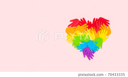 Tolerance, kindness, cooperative, friendship, charity humanitarian aid day concept. Many rainbow color palm hands on pink background with copy space 70433335