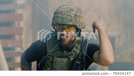 Dead soldier on battlefield during war 70434147