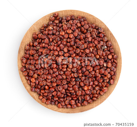 red quinoa seeds in wooden bowl isolated on white background with clipping path and full depth of field. Top view. Flat lay red quinoa seeds in wooden bowl isolated on white background with clipping path and full depth of field. Top view. Flat lay 70435159