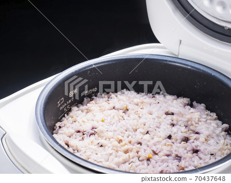 Freshly cooked rice, millet rice, rice cooker 70437648