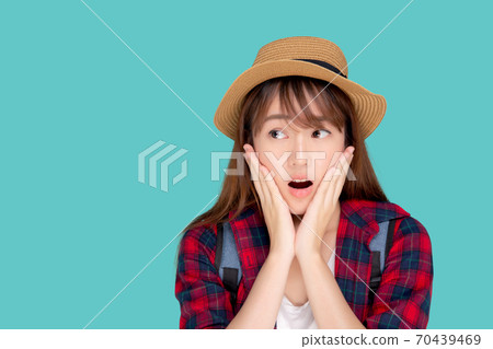 Beautiful portrait young asian woman smiling and surprise wearing travel summer. 70439469