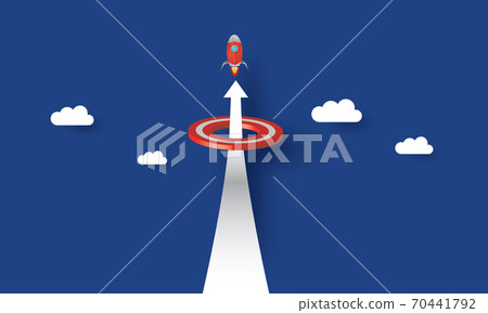 Rocket flying through a target, Business concept Rocket flying through a target, Business concept 70441792