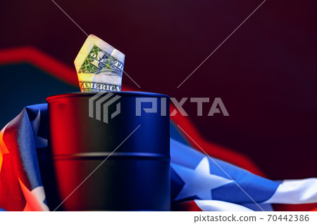 Oil prices fall concept. Oil barrel against decline chart 70442386