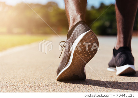 sport runner black man wear feet active ready to running training 70443125