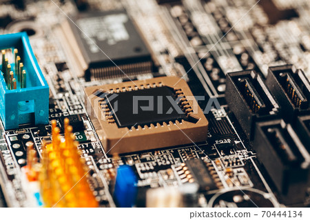 Computer electronic circuit board with processor close up 70444134