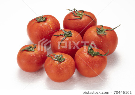 Fresh tomato white background 70446161