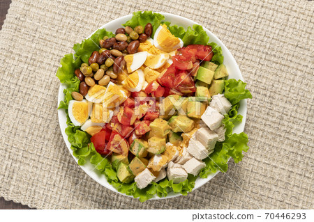 Chicken, avocado and tomato cobb salad 70446293