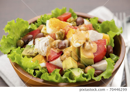 Chicken, avocado and tomato cobb salad Chicken, avocado and tomato cobb salad 70446299