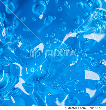 Water blue gel balls. Polymer gel. Silica gel. Balls of blue hydrogel. Crystal liquid ball with reflection. Texture background. Close up macro. Soapsuds background with air bubbles 70448779