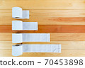 White tissues paper or toilet paper on wooden table. 70453898