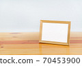 Empty wood photo frame on wooden table with copy space, picture memory. 70453900