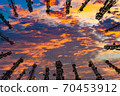 Silhouette of the antenna of cellular cell phone and communication system tower with Beautiful sunset sky, color dark tone, Telecommunication tower perspective. technology concept. 70453912