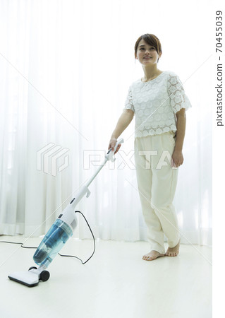 Woman cleaning Woman cleaning 70455039
