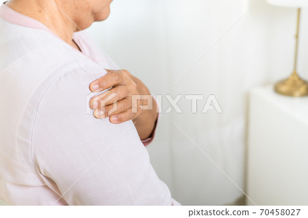 neck and shoulder pain of old woman, healthcare problem of senior concept 70458027