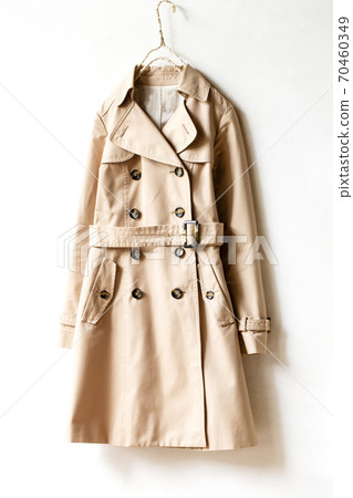 Light beige trench coat and white background 70460349