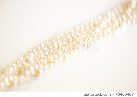 Pearl necklace up and white background and copy space Pearl necklace up and white background and copy space 70460407