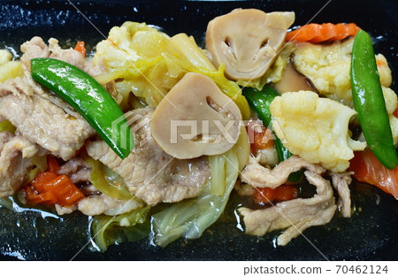 fried mixed vegetable with slice pork with soy sauce on plate 70462124