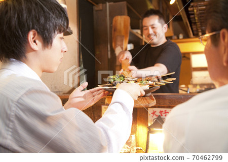 Businessman receiving food Businessman receiving food 70462799