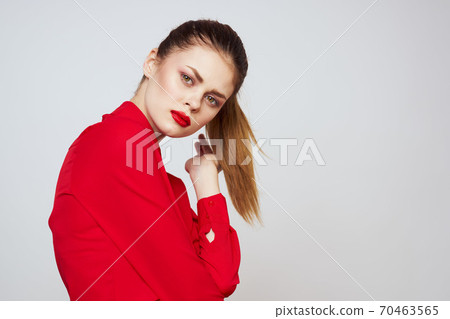 portrait of a woman with red lips in a shirt on a light background cropped view model makeup hairstyle portrait of a woman with red lips in a shirt on a light background cropped view model makeup hairstyle 70463565