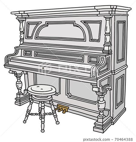 The old white pianino with a chair 70464388