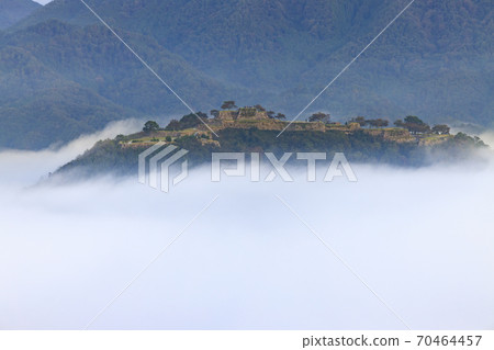 Takeda Castle floating in the sea of clouds at sunrise from Tachiunkyo Takeda Castle floating in the sea of clouds at sunrise from Tachiunkyo 70464457