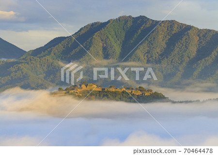 Takeda Castle floating in the sea of clouds at sunrise from Tachiunkyo Takeda Castle floating in the sea of clouds at sunrise from Tachiunkyo 70464478