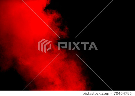 Red powder explosion on black background. Freeze motion of red dust particles splash. Red powder explosion on black background. Freeze motion of red dust particles splash. 70464795