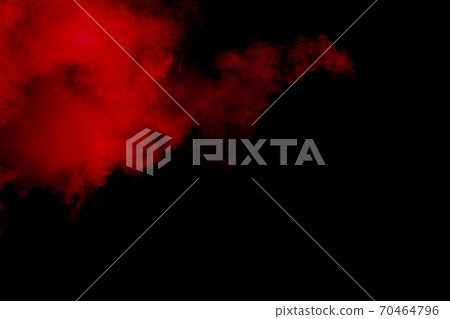 Red powder explosion on black background. Freeze motion of red dust particles splash. Red powder explosion on black background. Freeze motion of red dust particles splash. 70464796