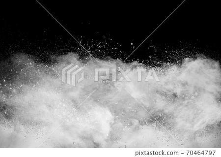 White powder explosion cloud against black background. White powder explosion cloud against black background. 70464797