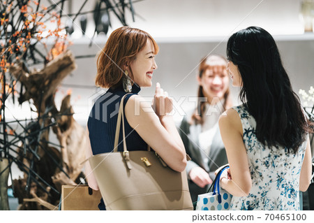 Women enjoying shopping at select shops Women enjoying shopping at select shops 70465100