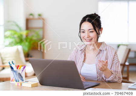 Young woman during telework Young woman during telework 70467409