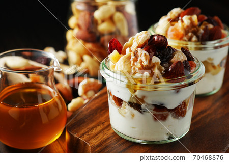 Yogurt with nuts and fruits Yogurt with nuts and fruits 70468876