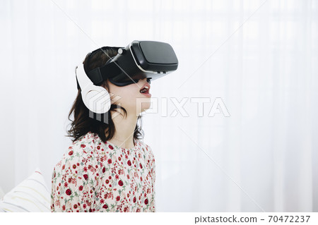 A woman watching VR 70472237