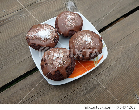 Chocolate muffins with coconut Chocolate muffins with coconut 70474205